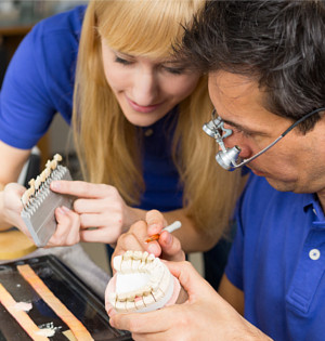 Closeup of porcelain veneers to fix chipped teeth at Kozica Dental in Worcester & Central, MA