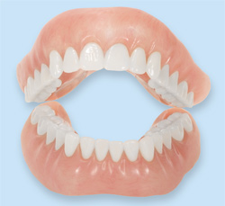 A photo of dentures that can be attained from Kozica Dental in Worcester, MA